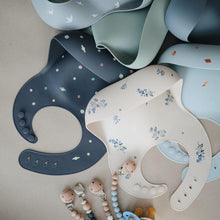 Load image into Gallery viewer, Mushie Silicone Baby Bib | Lilac Flowers