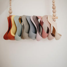 Load image into Gallery viewer, Mushie Silicone Baby Bib | Blush