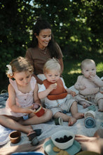 Load image into Gallery viewer, Mushie Silicone Baby Bib | Clay