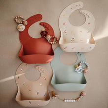 Load image into Gallery viewer, Mushie Silicone Baby Bib | Cambridge Blue