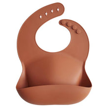 Load image into Gallery viewer, Mushie Silicone Baby Bib | Clay
