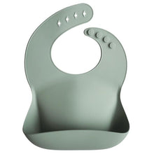Load image into Gallery viewer, Mushie Silicone Baby Bib | Cambridge Blue
